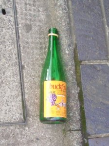 Source: "Buckfast bottle in the street". Licensed under Public domain via Wikimedia Commons - http://commons.wikimedia.org/wiki/File:Buckfast_bottle_in_the_street.jpg#mediaviewer/File:Buckfast_bottle_in_the_street.jpg